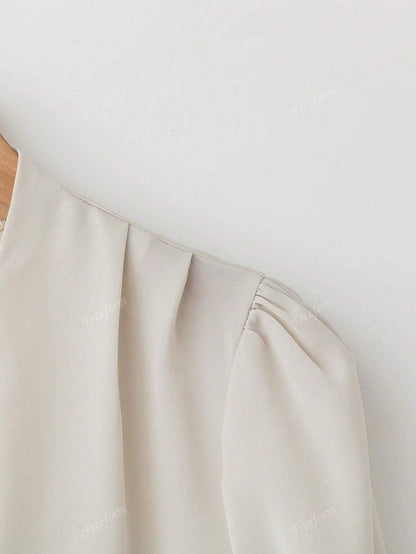 Blusa morbida con scollo a V taglia forte