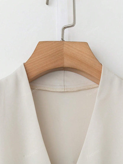 Blusa morbida con scollo a V taglia forte