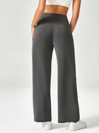 Pantaloni a gamba larga in modal con tasche
