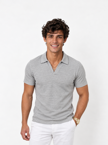 Polo in maglia a nido d'ape con scollo a V