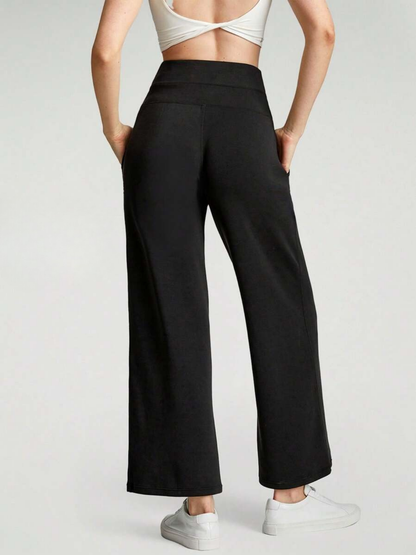 Pantaloni a gamba larga in modal con tasche