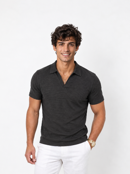 Polo in maglia a nido d'ape con scollo a V