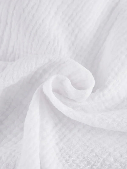 Completo in cotone composto da camicia e pantaloni ampi